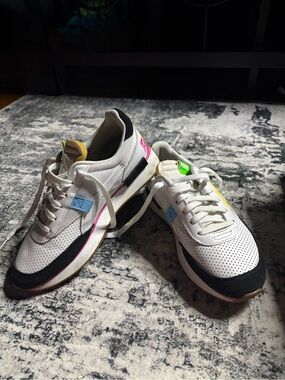 Puma White Kids' Sneaker Interior with Light Blue and Purple Accents